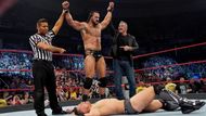 Drew McIntyre standing victorious over The Miz